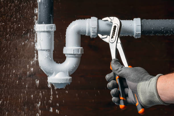 Professional Drain Cleaning technician working in Houston, AK